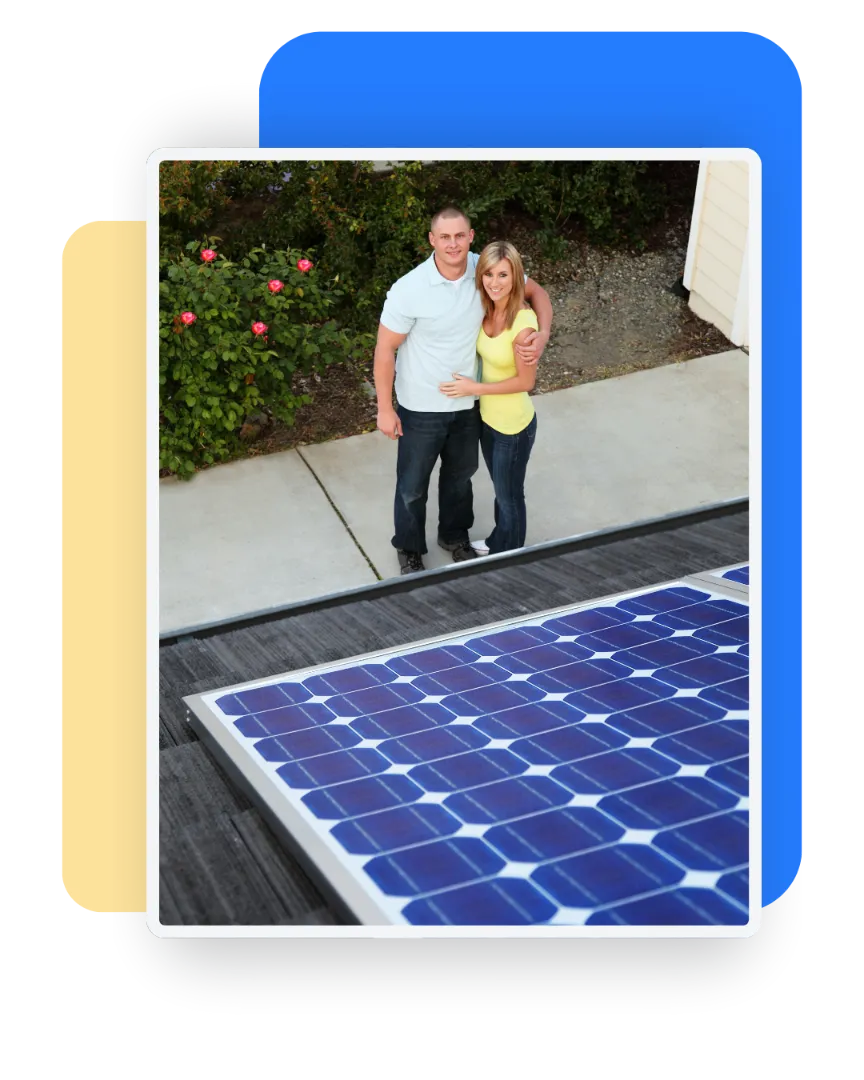 image of happy home owners looking up at their new solar roof